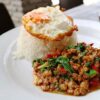 Basil Chicken Served With Fried Egg & Mini Spring Rolls