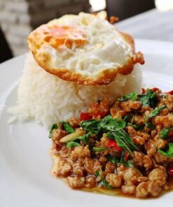 Basil Chicken Served With Fried Egg & Mini Spring Rolls